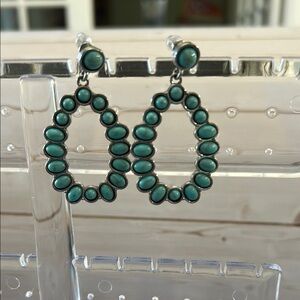 Green Teardrop Earrings with Open-Work Design